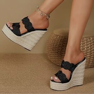 Elegant Black Leather Woven Wedge Sandals